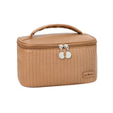 the cosmetic case in tan