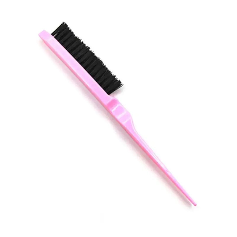 a pink brush with black bristles