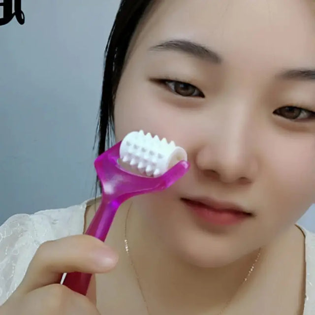 a woman brushing her teeth with a tooth brush