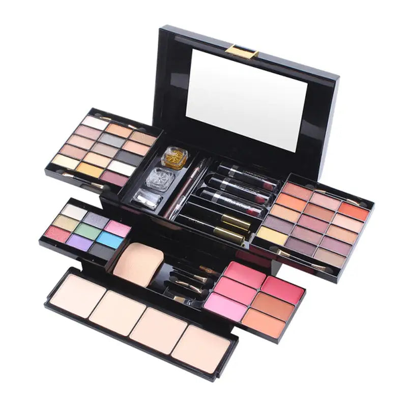 a close up of a makeup kit with a mirror and a mirror