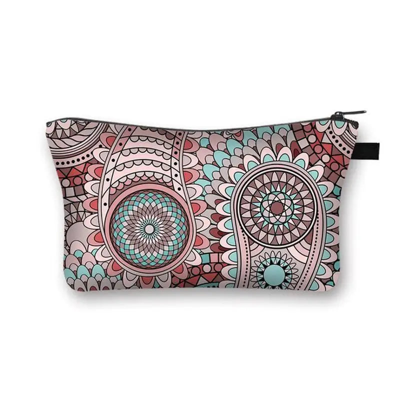 a pink and blue floral pattern cosmetic bag