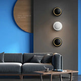 a couch in a room with a blue wall