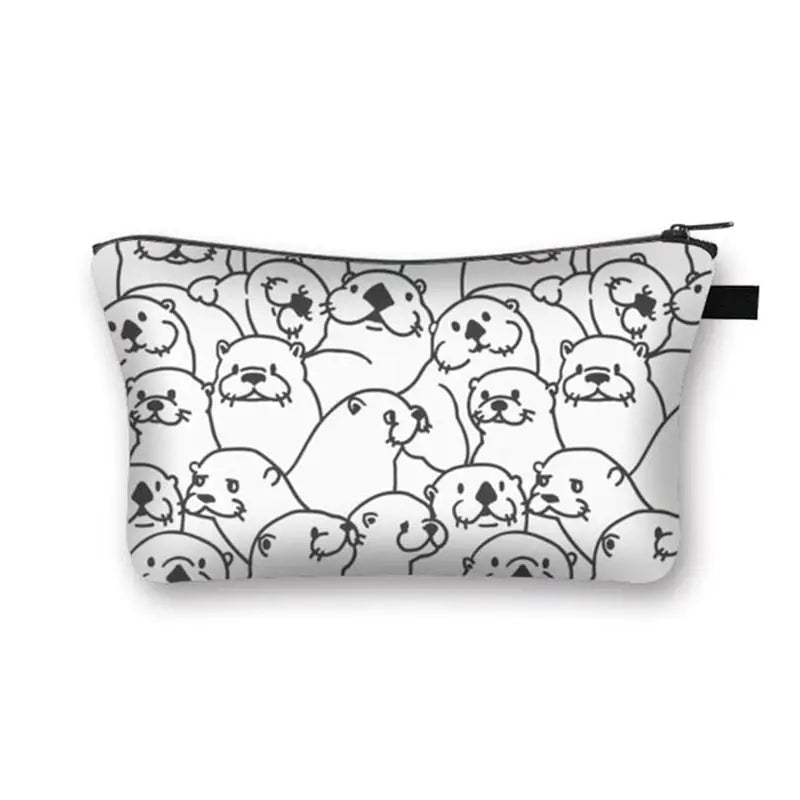 a white pillow with black and white birds on it