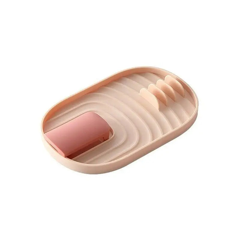 the pink nail is placed on the top of the nail