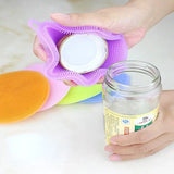 a person holding a jar of cleaning supplies