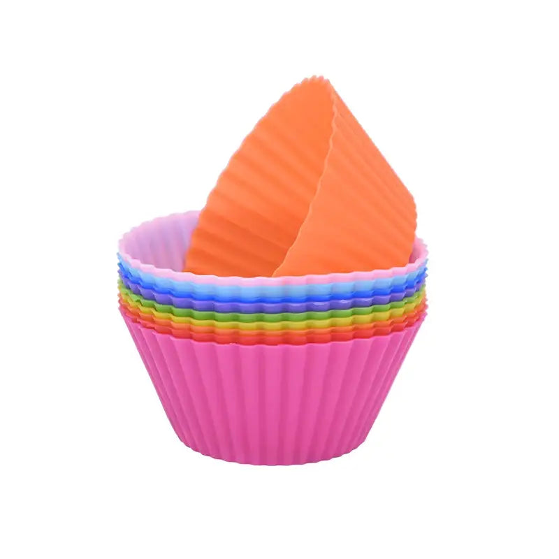 a cupcake liner with a rainbow colored paper liner