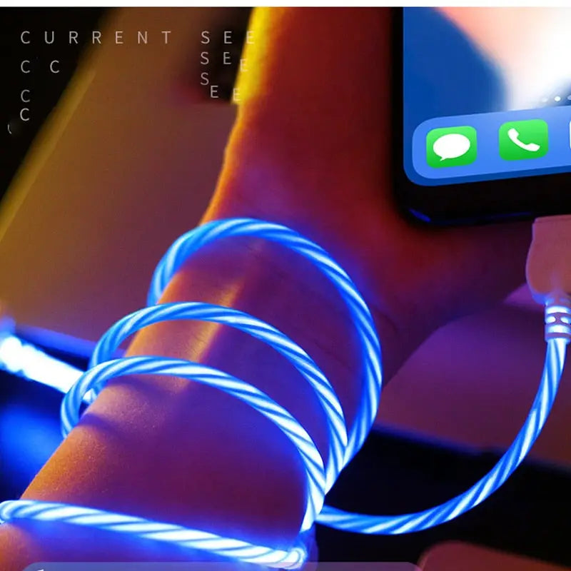 a person holding a cell phone with a glowing glow on it