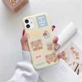 a woman holding a phone case with a bear pattern