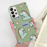 a hand holding a phone case with a pattern of cute animals