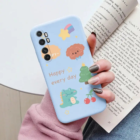 a woman holding a phone case with a cartoon design