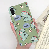 a person holding a phone case with a pattern of cats