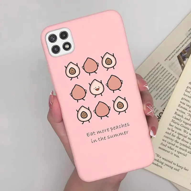 a pink phone case with a cartoon character on it