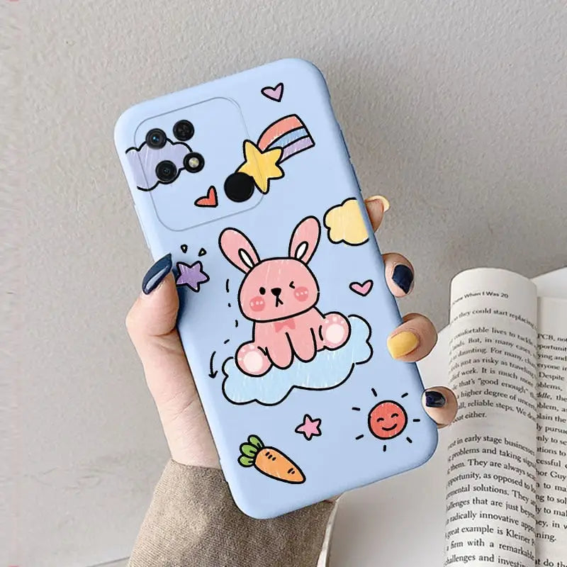 a hand holding a phone case with a cartoon character on it
