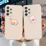 two people holding up their phone cases