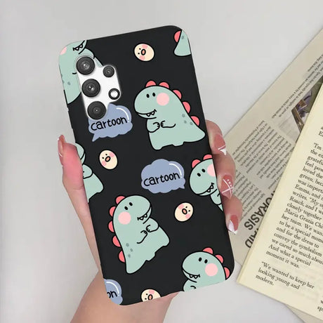 someone holding a phone case with a pattern of a cat and a dog