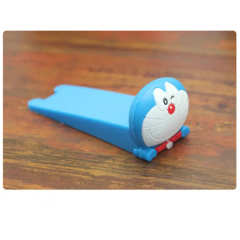 a blue toy with a red nose and a white nose