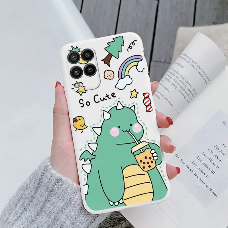 a woman holding a phone case with a cartoon character on it