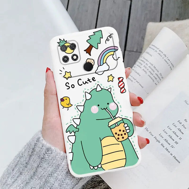 a woman holding a phone case with a cartoon character