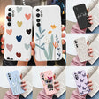 a close up of a person holding a cell phone case with different designs