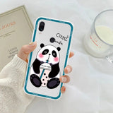 a woman holding a phone case with a panda bear