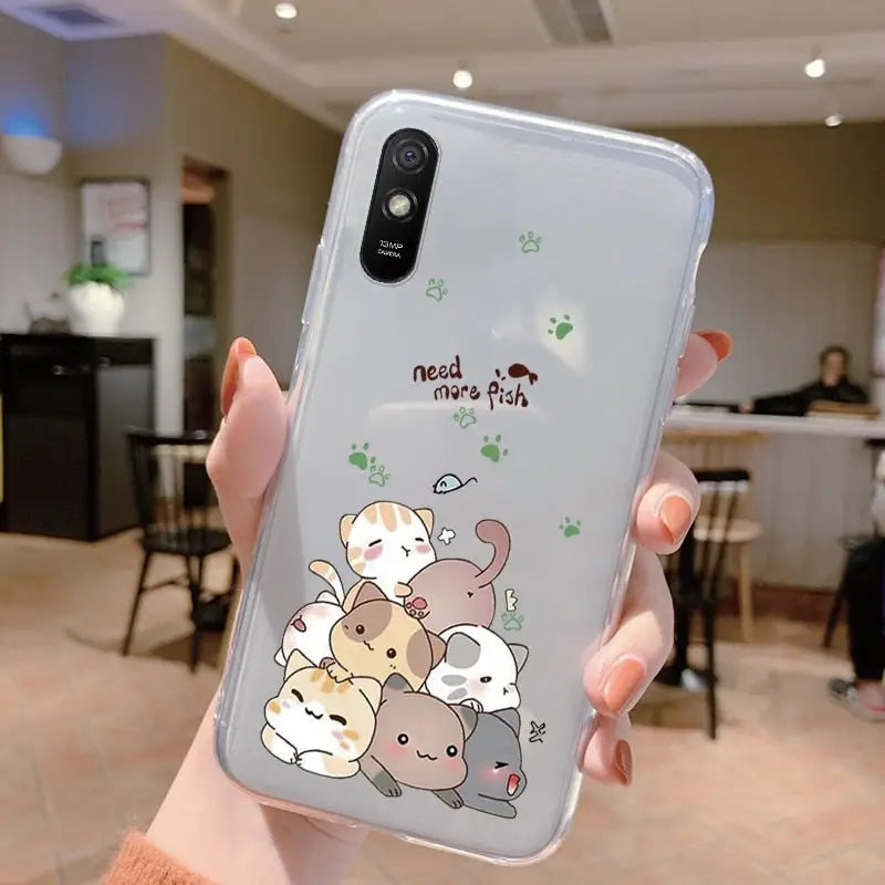 a woman holding a phone case with a cartoon cat and dog
