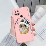 a woman holding a pink phone case with an owl wearing a hat