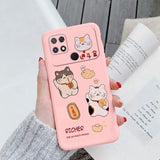 a woman holding a pink phone case with cartoon characters on it