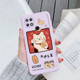 a woman holding a phone case with a cat on it