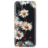a close up of a white and orange flower phone case
