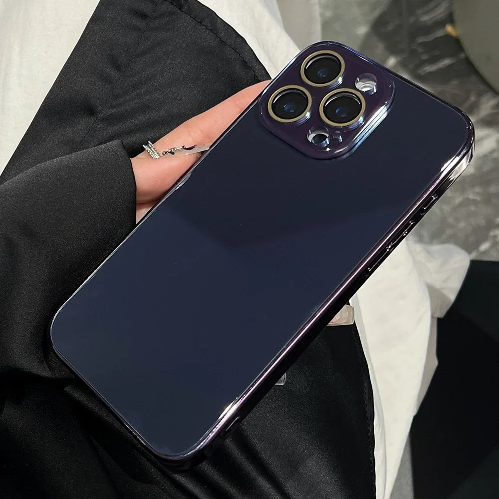 Dark blue smartphone with triple-lens camera.