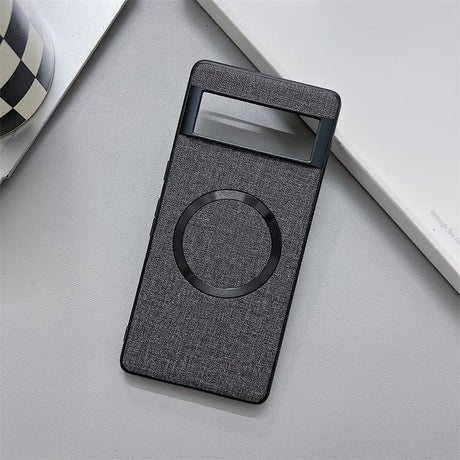 Dark gray fabric-covered smartphone case with a circular cutout and rectangular window.