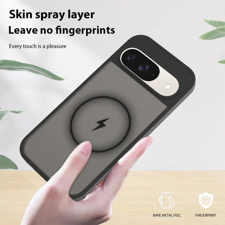 A dark gray phone case with a magnetic charging ring and a ’skin spray layer’ to prevent fingerprints.