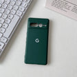 Dark green Google Pixel smartphone case with camera cutouts.