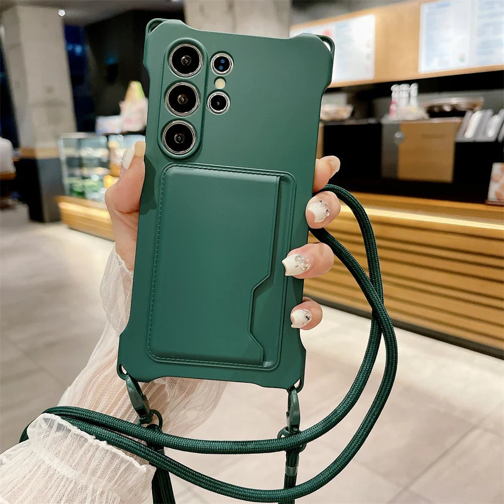 Dark green smartphone case with a card holder and an attached crossbody strap.