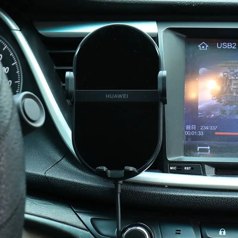 the dashboard of a car with a gps device