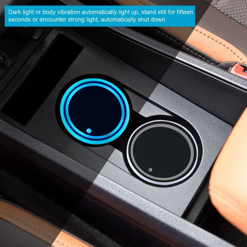 a car dashboard with a blue button on it