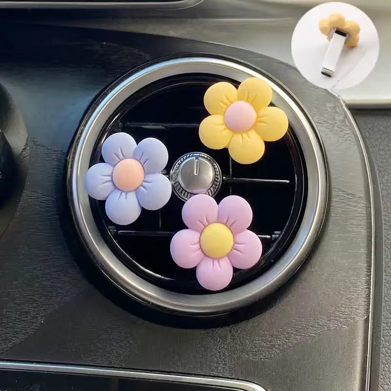 a car dashboard with a bunch of flowers on it
