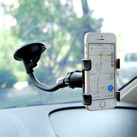 a car dashboard with a phone in the dashboard