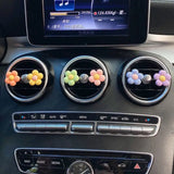 a car dashboard with a bunch of colorful balls