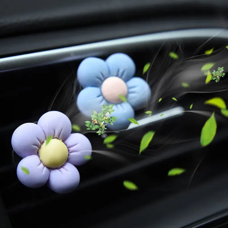 a car dashboard with flowers on it