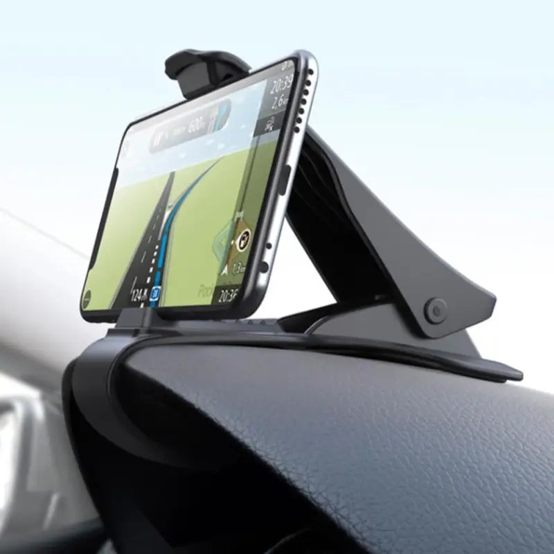 the car phone holder is attached to the dashboard