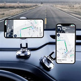 a car dashboard with two smartphones on it