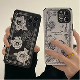 Decorative phone cases with floral designs and camera cutouts.