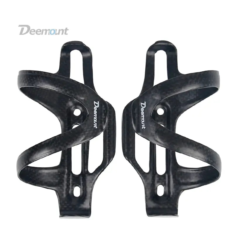 pair of black bicycle pedals with white lettering