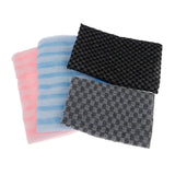 three different colored and black and white striped towels