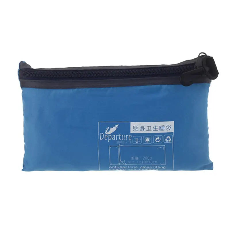 a blue bag with a zipper and a white label