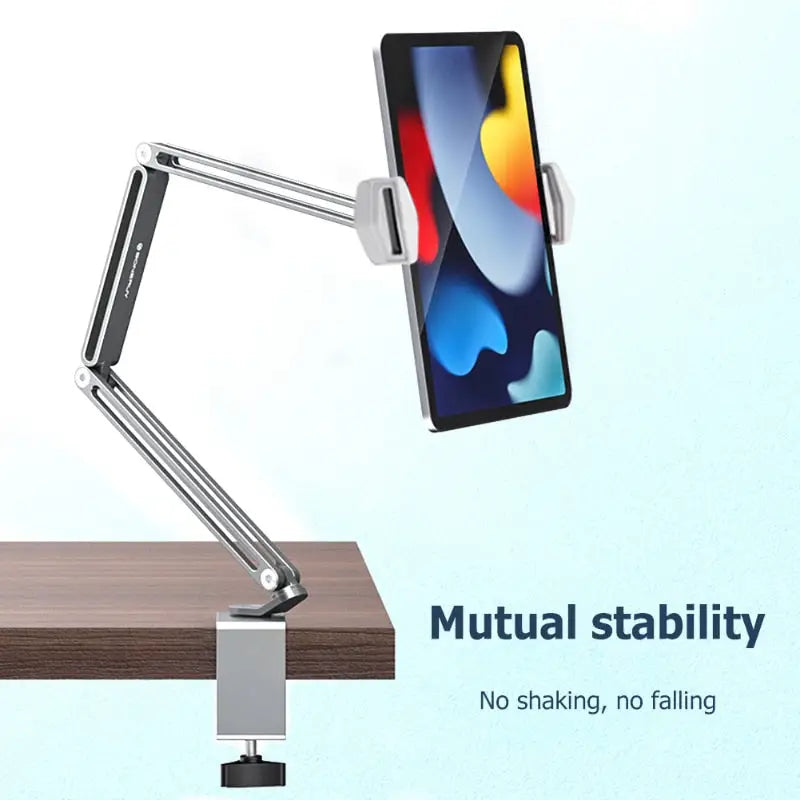 a desk lamp with a phone on it