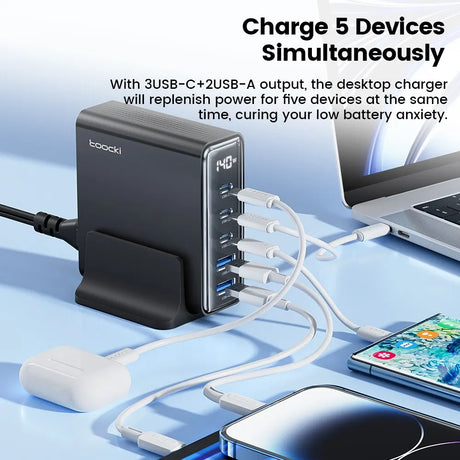 Desktop charger with multiple USB ports capable of charging five devices simultaneously.