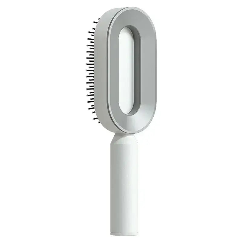 the brush attachment is a white plastic handle with a white handle