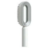 the brush attachment is a white plastic handle with a white handle